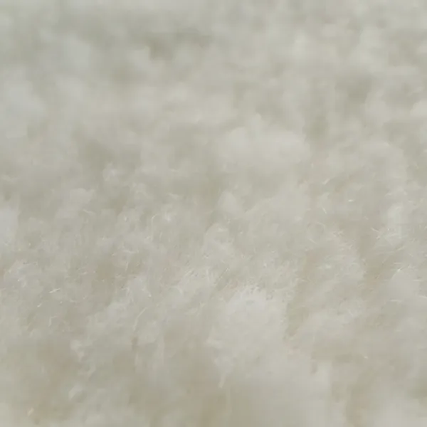 Zbliżenie białego materiału Poduszki Podłogowej Raypath