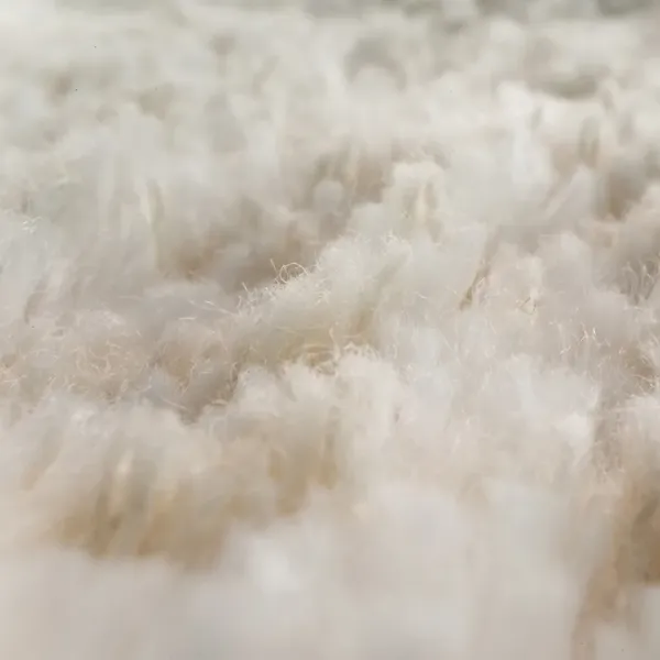 Zbliżenie beżowego materiału Poduszki Podłogowej Pielęgnacyjnej Raypath